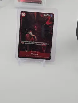 One Piece TCG Shanks Alt Art Super Rare Emperors in the New World Card OP09-004 - Image 1