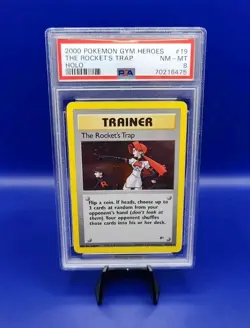 The Rocket's Trap 19/132 Holo Rare Unlimited Gym Heroes Pokemon Card Grade PSA 8 - Image 1