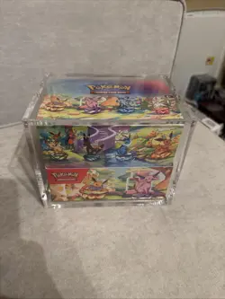 Pokemon SV8.5 Prismatic Evolutions Mini Tins Display Sealed. In Acrylic Case - Image 1