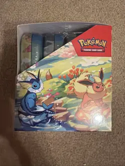 Pokemon SV8.5 Prismatic Evolutions Mini Tins Display Sealed. In Acrylic Case - Image 4