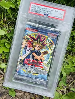 Yu-Gi-Oh! Legacy of Darkness 1st Edition LOD Sealed Booster Pack PSA 9 Mint - Image 1