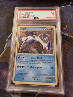 2011 POKEMON CALL OF LEGENDS LUGIA #15 HOLO PSA 1 - Image 1