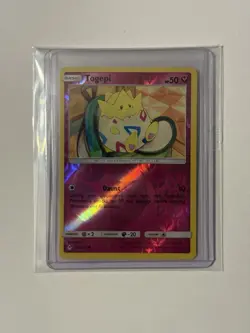 Pokemon TCG Unbroken Bonds Togepi 136/214 Reverse Holo - Near Mint Condition! - Image 1