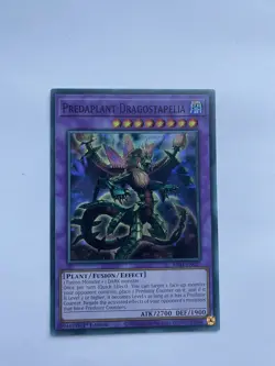 RA01-EN027 PREDAPLANT DRAGOSTAPELIA SUPER RARE 1ST EDITION YuGiOh CARD - Image 1