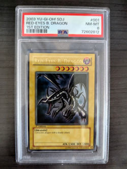 2003 Yu-Gi-Oh Red Eyes B Dragon SDJ-001 1st Edition PSA 8 - Image 1