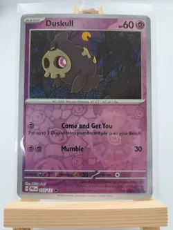 Pokemon Prismatic Evolutions Card Duskull Reverse Holo #035 Common - Image 1