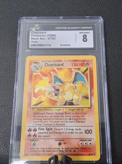 CGC 8 Charizard 1999 Base Set 4/102 Holo Pokemon Card - Image 1
