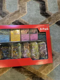 Pokemon TCG: Scarlet & Violet Prismatic Evolutions 8 Pack Mini Tin Set (Costco) - Image 4
