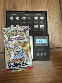 Pokemon Prismatic Evolutions Booster Pack -HEAVY 24.0g- *Possible Demi/God Pack - Image 1