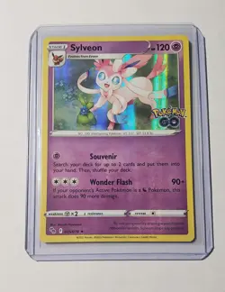 Pokemon Sylveon 35 Pokemon Go Ultra Rare Holo Card + Top Loader - Image 1