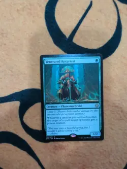 Venerated Rotpriest Phyrexia: All Will Be One Regular - Image 1