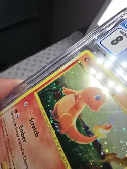 2008 POKEMON DIAMOND & PEARL STORMFRONT #101 CHARMANDER-HOLO CGC 8 - Image 4