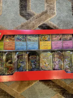 Pokemon TCG: Scarlet & Violet Prismatic Evolutions 8 Pack Mini Tin Set X4 - Image 3