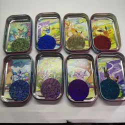 Prismatic Evolutions *EMPTY* Mini Tin Complete Set Of 8 (Tin + Card + Coin) - Image 1