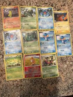 Lot Of 11 Starter Pokemon Cards Various Years And Sets - Image 1