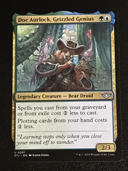 MTG Outlaws of Thunder Junction Doc Aurlock, Grizzled Genius 0201 NM - Image 1