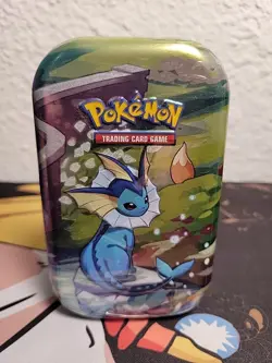 Pokemon - Prismatic Evolutions Vaporeon Sealed Mini Tin 2 Booster packs - Image 1