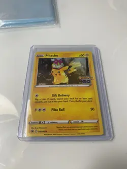 Pokemon Pikachu SWSH234 Promo Pokemon Go holo WITH SWIRL - Image 1