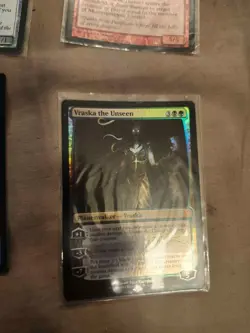Damaged, English MTG Foil Vraska the Unseen Duel Deck - Image 1
