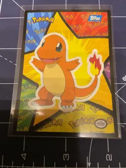 1999 Topps Pokemon the First Movie Puzzle Charmander Blue Logo - Image 1