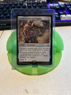 Sword of Feast and Famine(Universes Beyond: Assassin's Creed) - Image 1