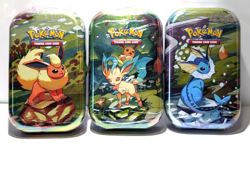 Pokemon TCG Prismatic Evolutions Mini Tin Lot of 3-New/Factory Sealed - Image 1