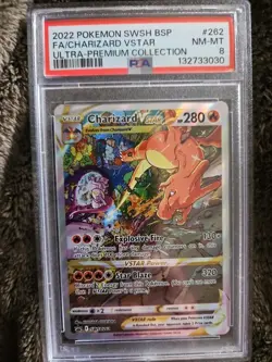 Pokemon-Charizard VSTAR-UPC-(2022)-#262- PSA NM-MINT 8 - Image 1