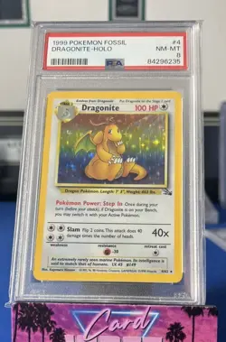 1999 POKEMON FOSSIL #4/62 DRAGONITE HOLO PSA 8 - Image 1