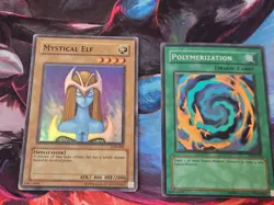 Yu-Gi-Oh! Polymerization + Mystical Elf Wavy Glossy LOB-059 062 Super Rare - Image 1