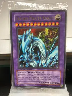 YuGiOh Dragon Master Knight UE02-EN001 "Ultimate Edition 2" Ultra Rare - Sealed - Image 1