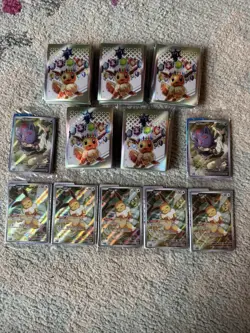 Sealed Eevee Promo, Sealed N’s Zorua Pokemon Center Promo, Prismatic Sleeves - Image 1
