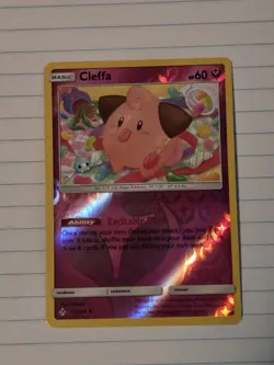 Cleffa 131/214 NM Rev Holo Discontinued Fairy ODDISH Art Unbroken Bonds Pokemon! - Image 1