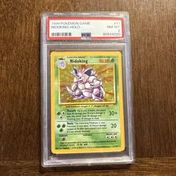 1999 POKEMON BASE SET UNLIMITED #11 NIDOKING-HOLO PSA 8 - Image 1
