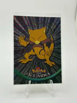 1999 Topps Pokemon TV #63 Abra Silver Foil Black Logo embossed rays holo lp - Image 1