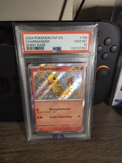 Paldean Fates Charmander Shiny Rare Card PSA 10 - Image 1