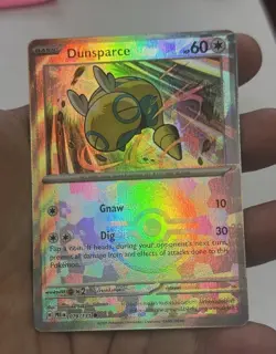 ERROR CARD Pokemon TCG Prismatic Evo. Dudunsparce-Pokeball Texture Shift Error - Image 1