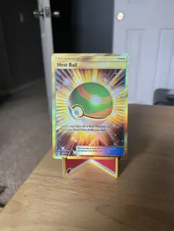 Pokemon TCG Nest Ball Gold Holo Card Sun & Moon Secret Rare 158/149 - Image 1