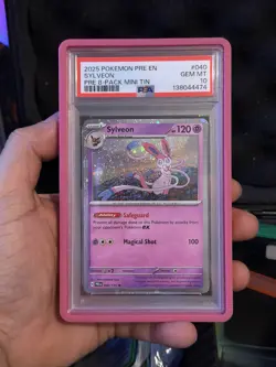 2025 POKEMON PRISMATIC EVOLUTIONS 040 SYLVEON COSMOS HOLO PROMO MINI TIN PSA 10 - Image 1