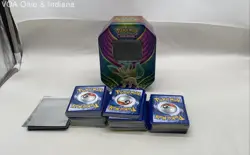 Collection Of Pokemon Trading Cards With Storage Tin And Card Sleeves - Image 1