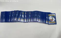 Collection Of Pokemon Trading Cards With Storage Tin And Card Sleeves - Image 5