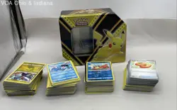 Collection Of Assorted Pokemon Trading Cards And Storage Tin - Image 1