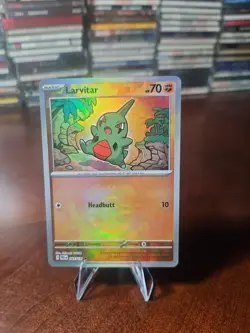 Larvitar 047/131 - Pokemon SV Prismatic Evolutions - Masterball Holo Common (NM) - Image 1