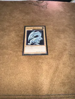Blue-Eyes White Dragon OP28-EN001, OTS Tournament Pack 28 Ultimate Rare (LP) - Image 1