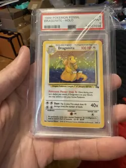 1999 Pokemon Fossil Dragonite Holo PSA 9 - Image 1