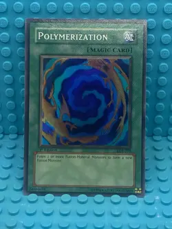 Yugioh! Polymerization 1st Edition LOB-059 NM-LP - Image 1