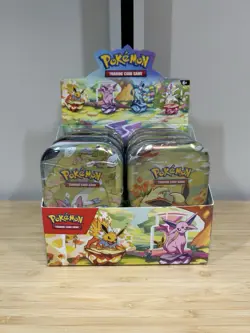 Pokemon Prismatic Evolutions Sealed Mini Tins Full Set of 8 English Open Display - Image 1