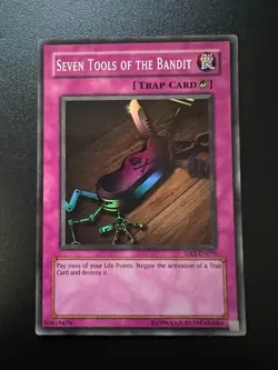 Seven Tools of the Bandit DB2-EN075 Super Rare Near Mint Yugioh - Image 1