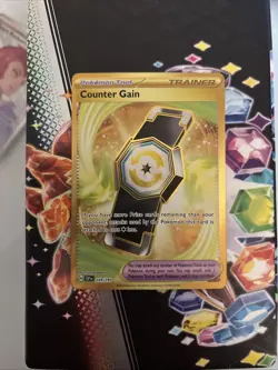 🔥Counter Gain 249/191 Pokemon Surging Sparks Hyper Rare Gold NM🔥 - Image 1