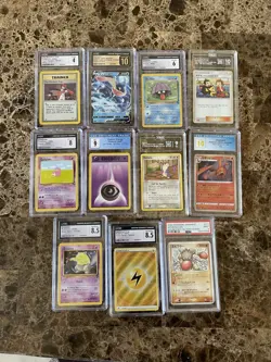 Lot Of 11 Pokemon Slabs - Image 1