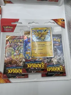 4x Pokemon Surging Sparks 3-Pack Blister Card - Image 2
